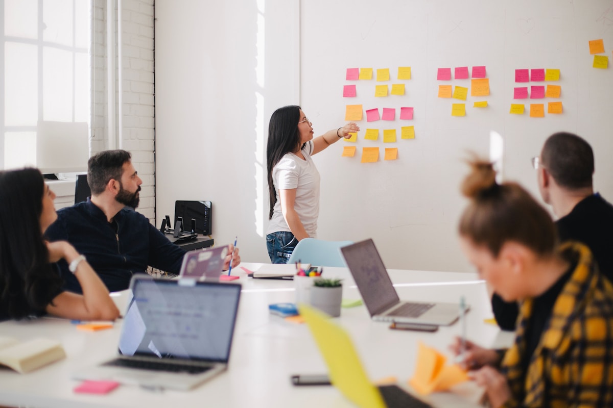 A creative team planning work with colorful notes